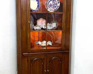 Georgian revival style corner cabinet