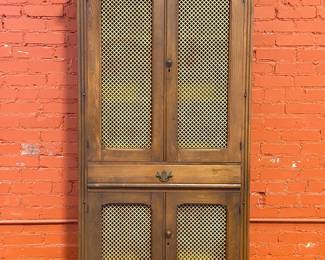 Circa 1900 pie safe cabinet. This is an example of a late 19th century furniture factory made pie safe.