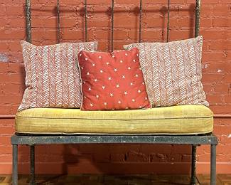 Antique iron bench made from the headboard of an old headboard of an iron bed. It was not unusual to repurpose items especially during the Great Depression