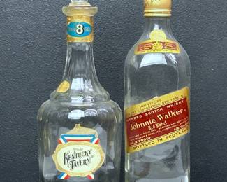 Vintage empty Kentucky Tavern and Johnnie Walker bottles