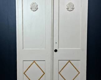 A set of interior double doors that were originally in a Dallas home designed by architect, Harwood K. Smith