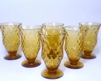 Circa 1930 amber glass footed tumblers with diamond optic