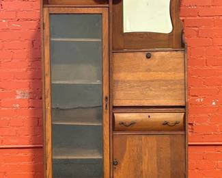 Antique Oak Curio Cabinet and drop down secretary desk.