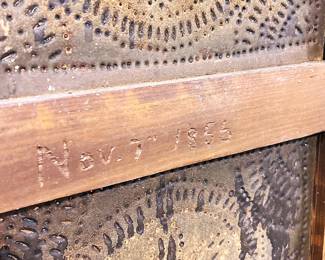 Hand carved date of Nov. 7, 1855 on the interior side of the cabinet door