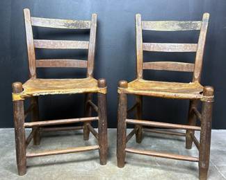 Antique Texas primitive ladder back chairs with cowhide seats