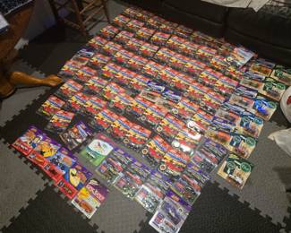 Over 100 new in package Johnny Lightning Cars