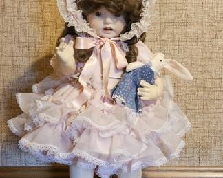 Collectable Porcelain Doll in Pink Ruffled Dress