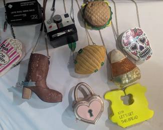 Various kitsch bags a -few Betsey Johnson photographed here. ( $10- $75)