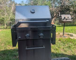 KitchenAid 2 burner propane grill with tank $100
Charcoal grill ( pictured in back) $40- needs post