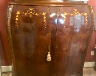 Gorgeous French style dining armoire with marble top and built in bar