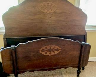 Antique full size inlaid curved footboard bed