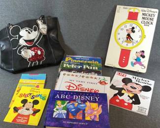 Assorted Disney childrens books and leather tote bag