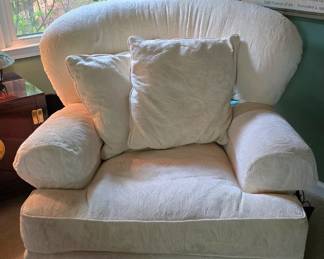 There are 2 of these chairs. The other has the ottoman