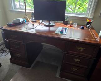 Leather top desk has some slight damage