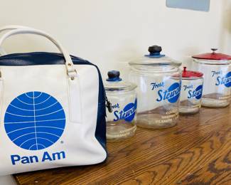 Pan Am flight bag and vintage Fresh Stewart's Peanuts and Candy Jar Advertising Sign