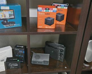 Fire TV cube, Garmin drive 50, Weather radio, 