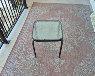 Glass side table and rug