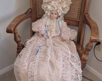 Chair with vintage doll