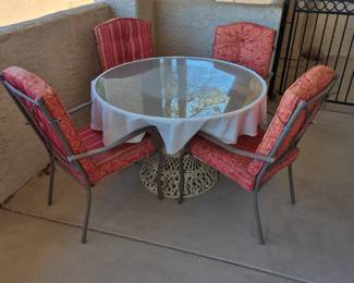 Glass table with 4 chairs