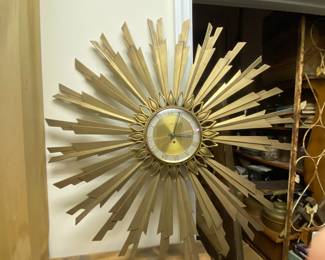sunburst metal clock