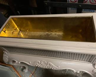 planters with brass inserts. there are 2