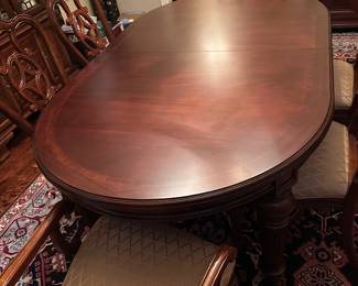 Another view of the Thomasville dining table with six chairs. It also has an additional leaf to make the table bigger.