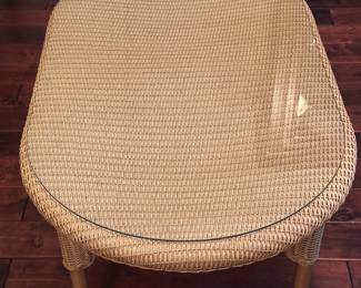 Lloyd Flanders Wicker table with glass top. This is a set with sofa, rocker, table and chair