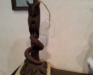 Carved owl with snake lamp