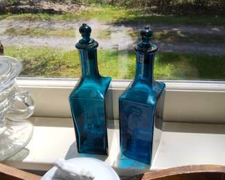 Blue hair remover bottles