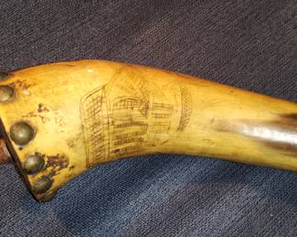 Scrimshaw powder horn