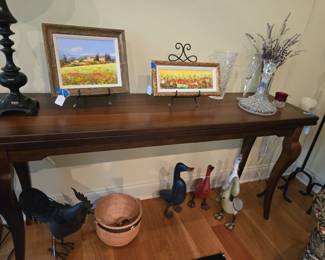 Sofa table top opens and swivels