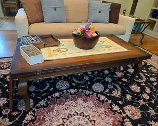 Coffee table, top opens and swivels
