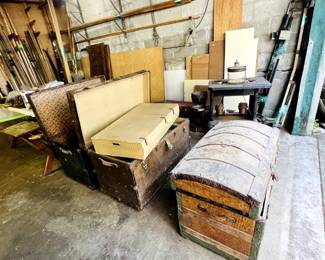 Vintage trunks, wood bundles