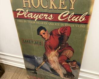 Wooden Hockey Players Club sign