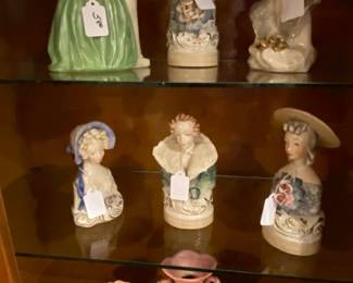 A china cabinet with goodies displayed.