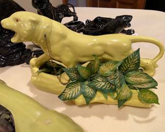 GRRR!  Lighted big cat TV fellow with greenery.  Perfect compliment to your retro room.