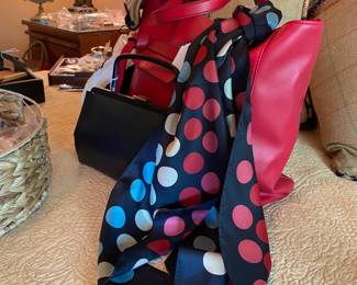 Bright scarves and a sweet red carrying bag.