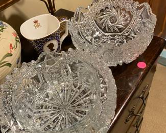 Cut glass bowls stacked up.