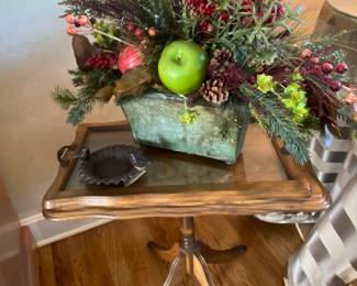 Small occasional table with glass tray on top.  Nice greenery.