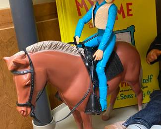 Vintage Marx cowgirl on horse.