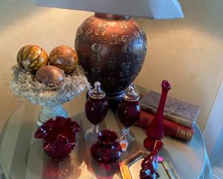 Ruby red glassware and pretty table lamp.