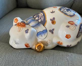 Ah.... sweet sleeping kitten figurine.
