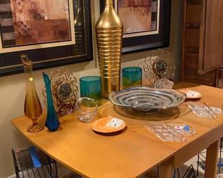Super nice MCM drop leaf table with fun stuff on top.