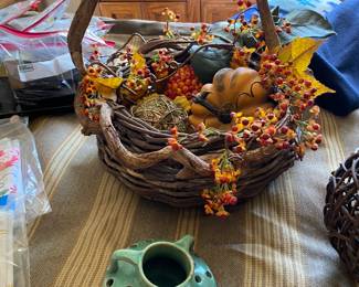 Decorative fall basket and  unusual ceramic pottery.