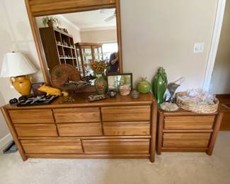 Clean contemporary dresser, mirror and side table.