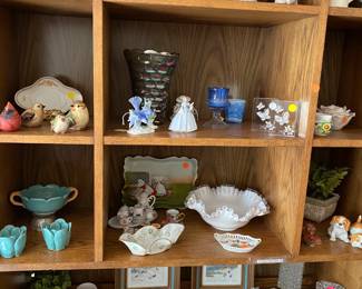Shelves full of miniatures and other goodies.