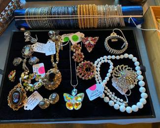 More signed vintage jewelry.  This view shows some West German cameo pieces, and the white strand is by Miriam Haskell.