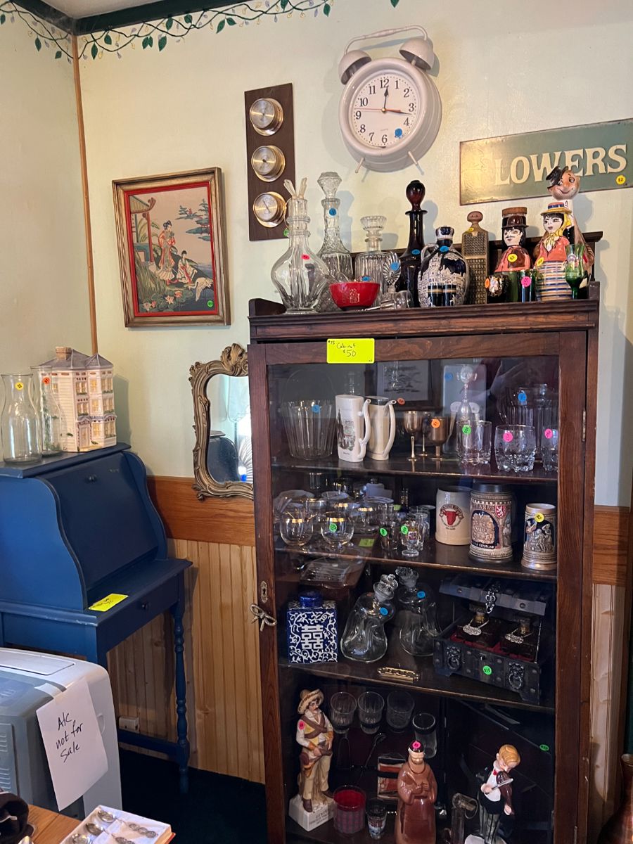 Quarter-sawn white oak cabinet with many bar accessories