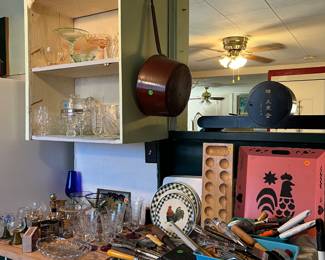 Glassware, kitchen ware, and clock (back shown in opening)