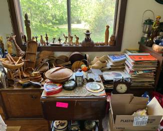 Wooden bowls, plates, and figurines; tons of sheet music and music books for piano